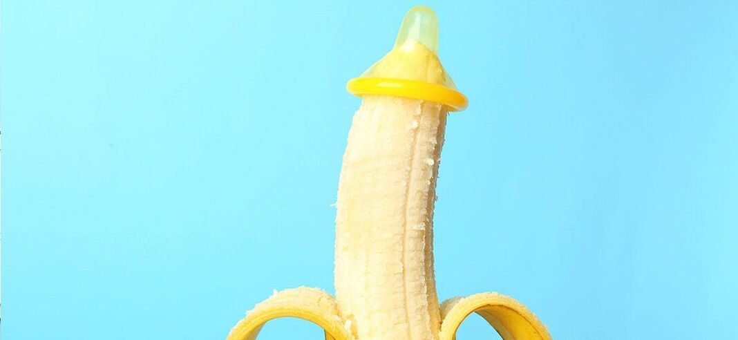 banana in a condom as imitation of penis enlargement without surgery